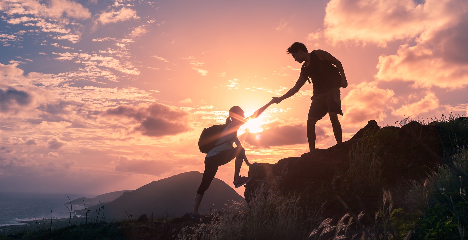 User centered design & user journey are where AIXD (AI experience design) begins & ends: user experience design for brand experience, per founder Joanne Z. Tan (image of a helping hand)